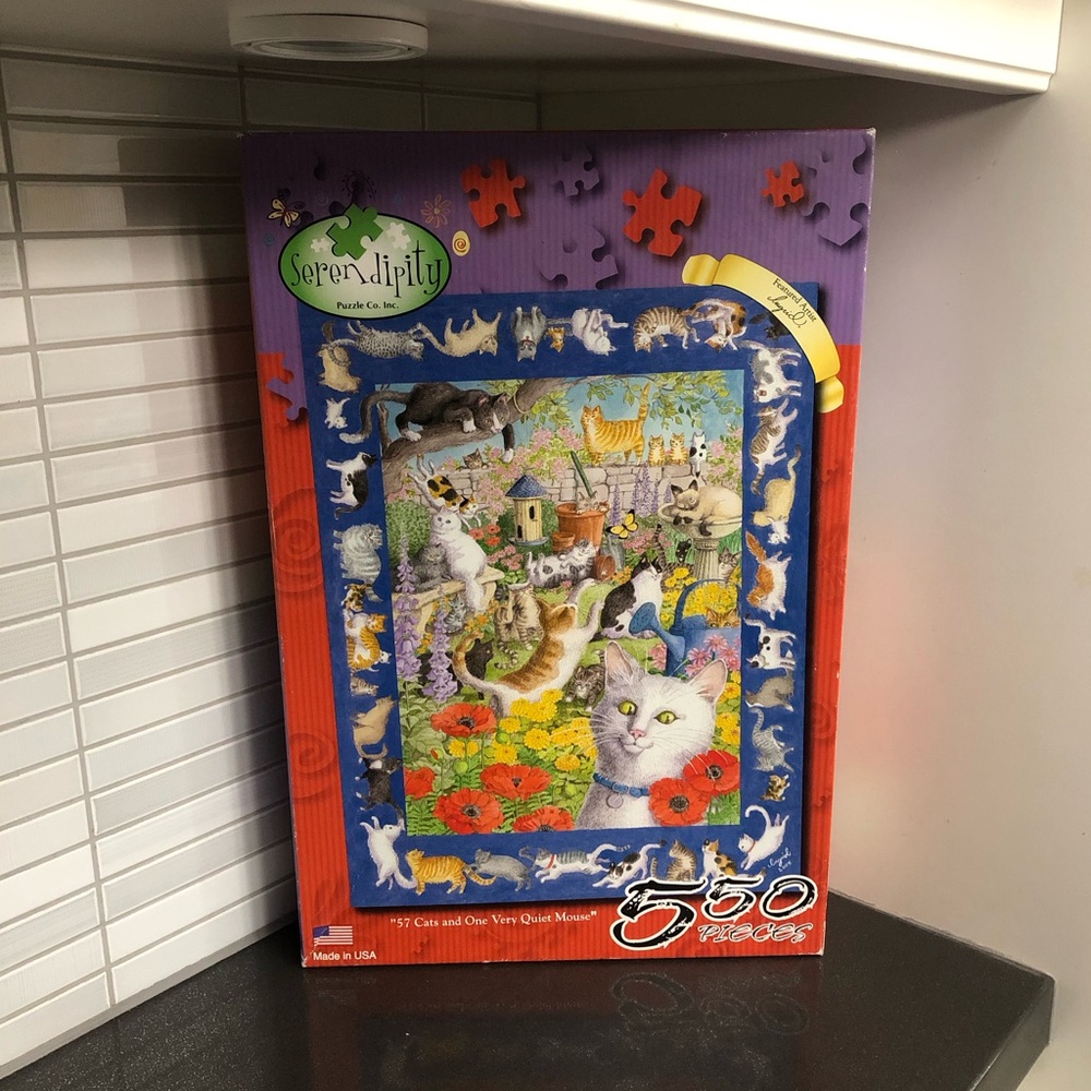 550 piece 57 Cats and One Very Quiet Mouse puzzle